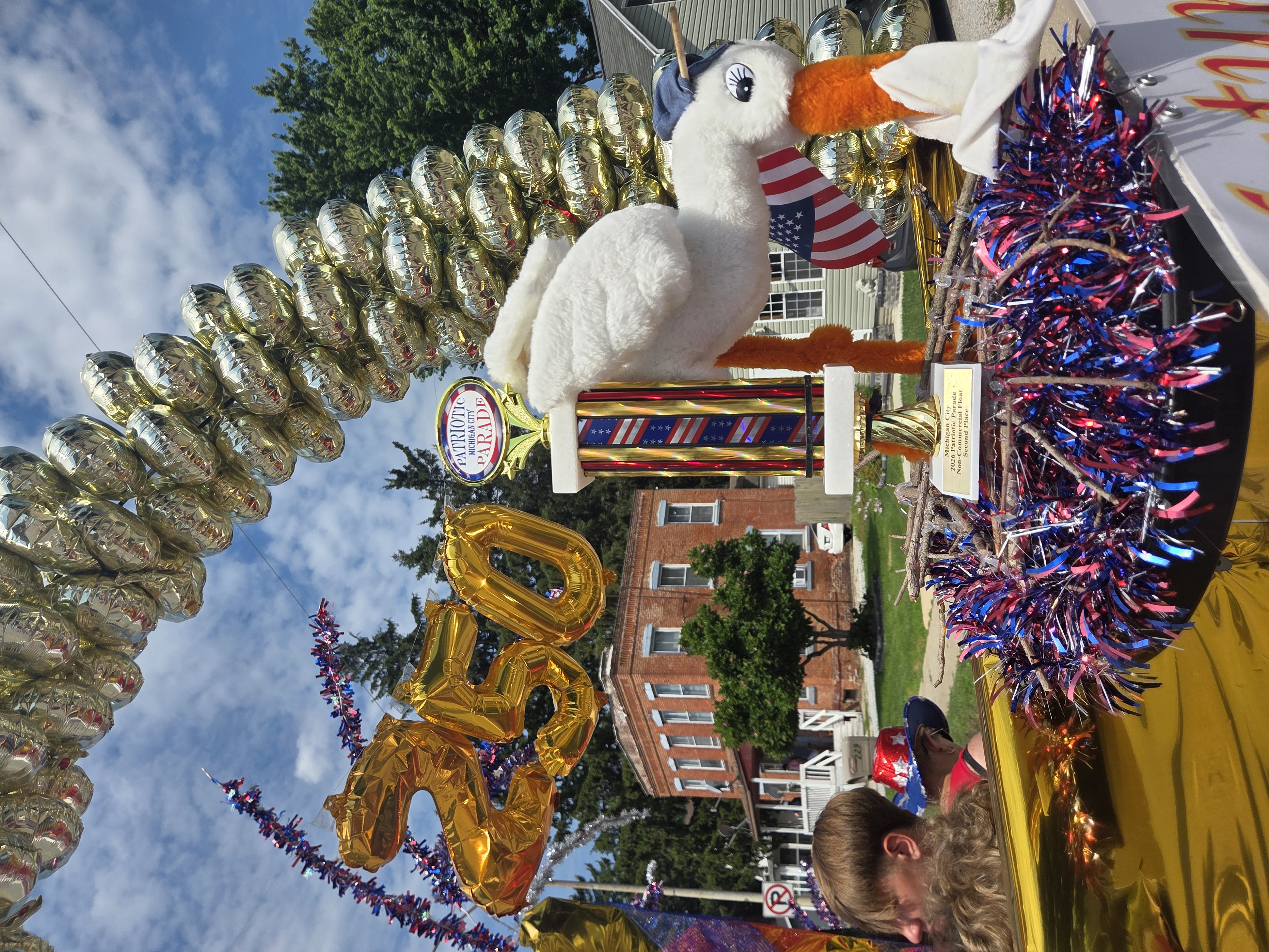Volunteers preparing the Meals on Wheels float for the Fourth of July parade