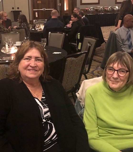 Community members at a Meals on Wheels fundraising dinner